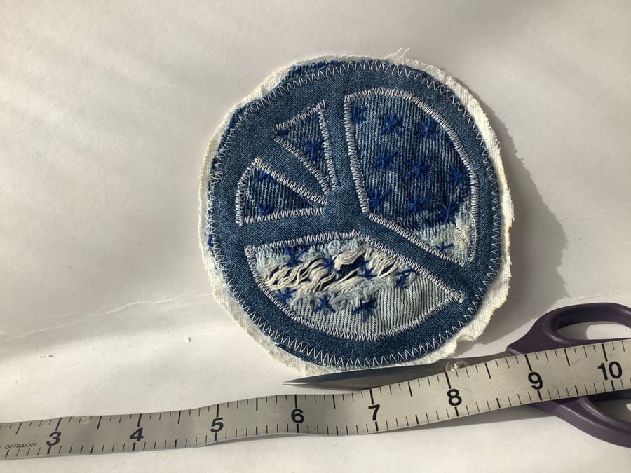 Denim peace fabric patch. 