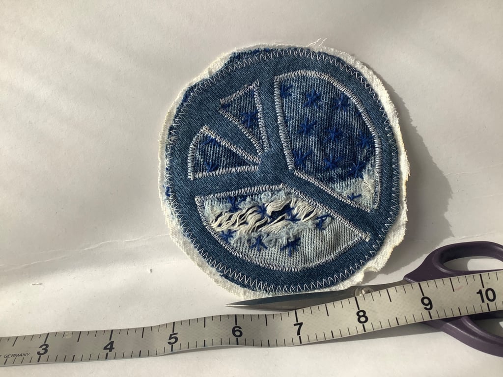 Denim peace fabric patch. 
