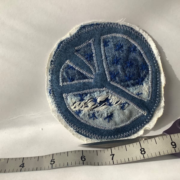 Denim peace fabric patch. 