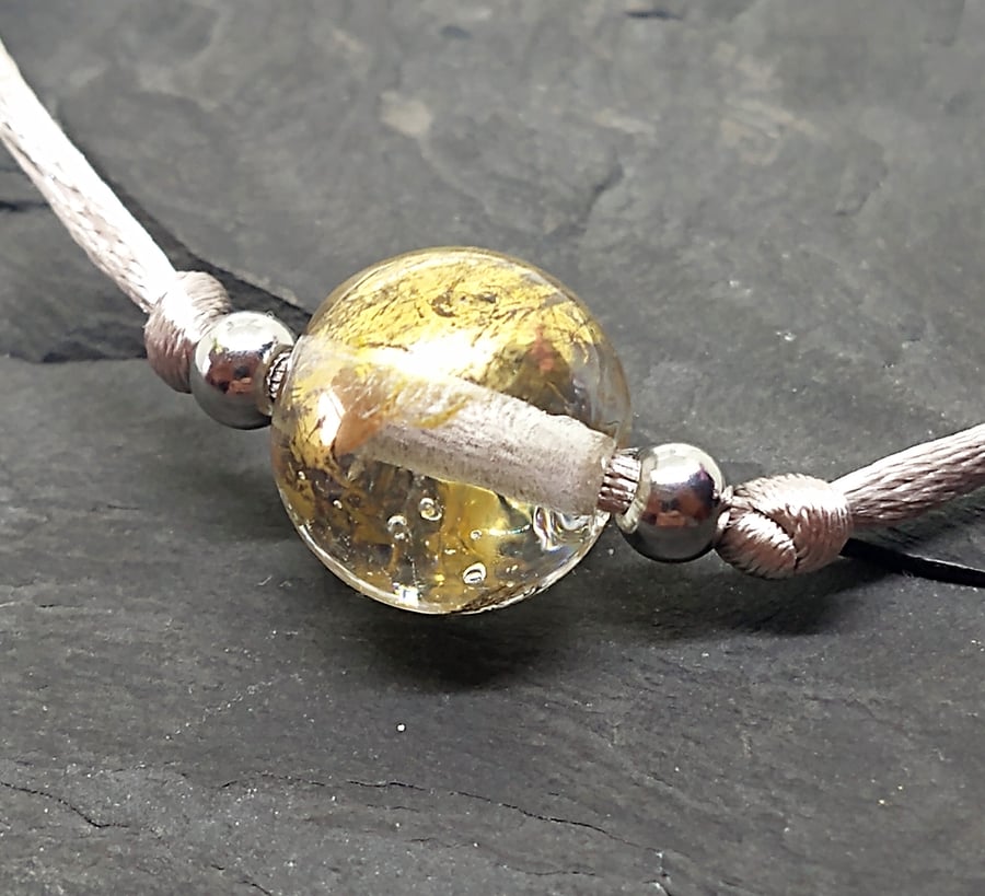 Golden orb slider bracelet Lampwork
