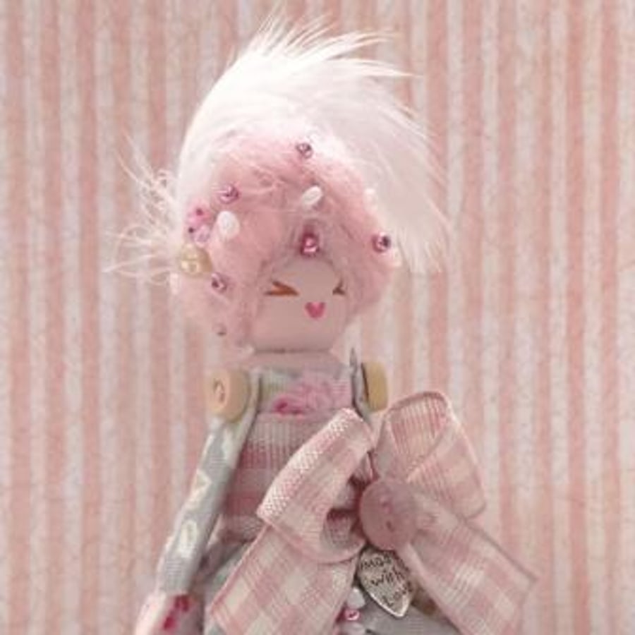 Yolande, a handmade peg doll