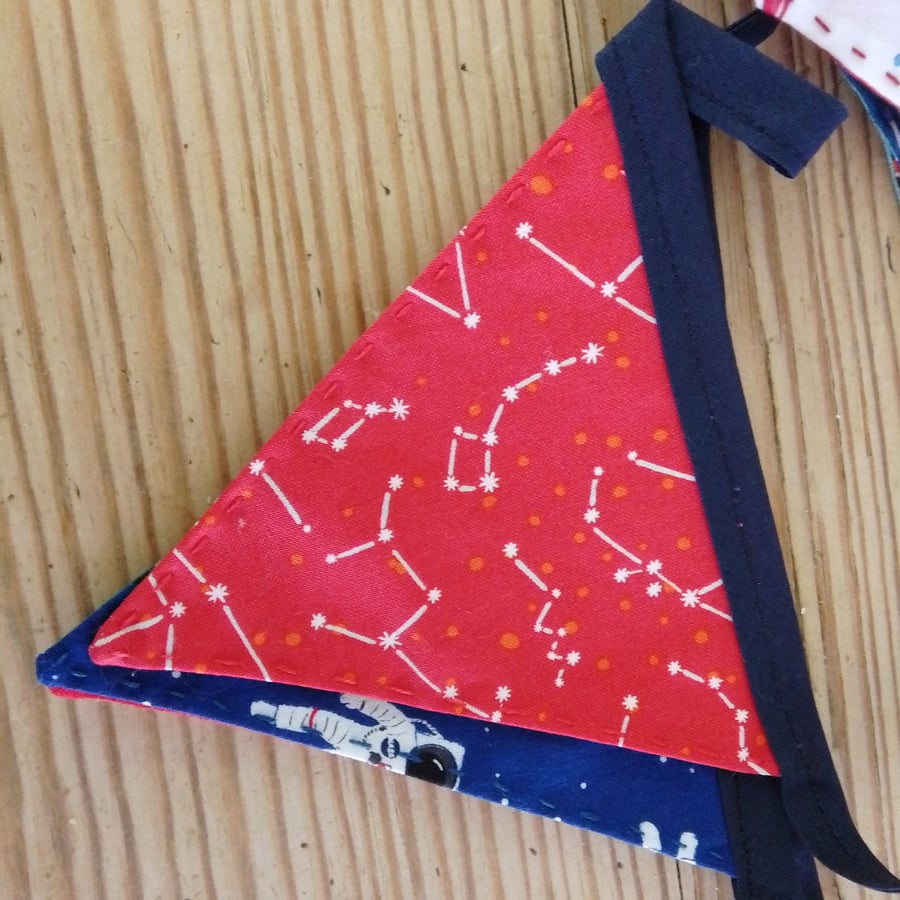 Mini bunting in a space theme (1) ideal for party or room decoration.