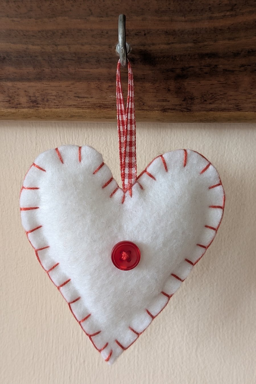 Handmade handstitched felt heart - white with red stitching
