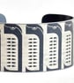 Geometric penguin pattern aluminium cuff dark- grey