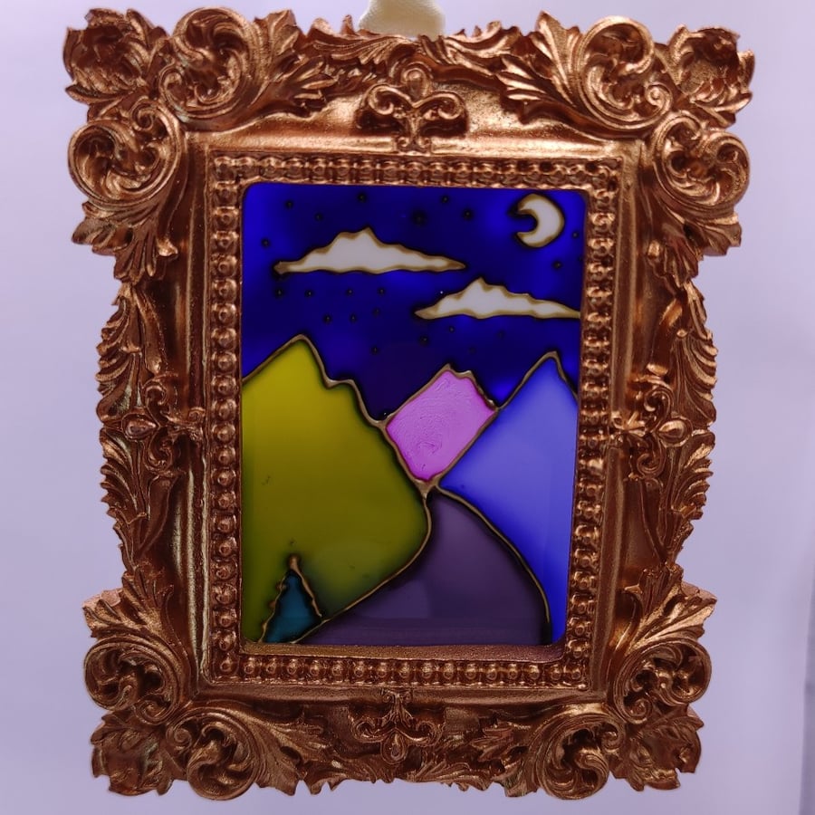 Handmade glass painted window hanging or Christmas tree bauble