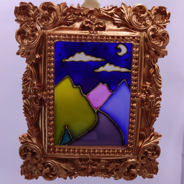 Handmade glass painted window hanging or Christmas tree bauble