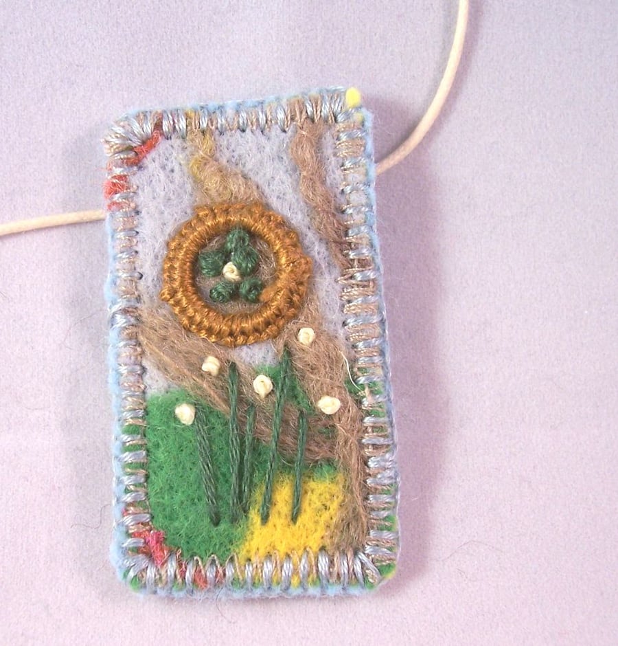 Sold. Felted and hand embroidered necklace - marsh marigold