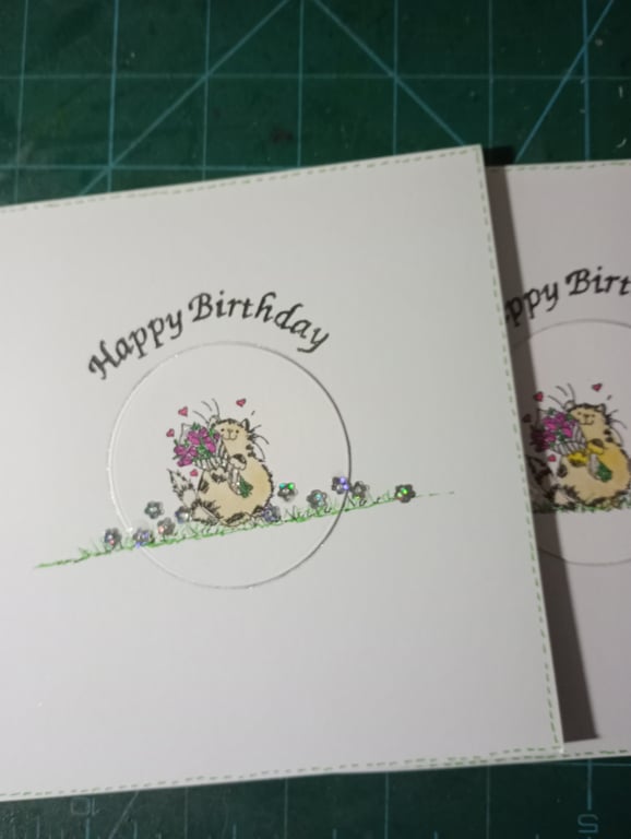 Cute cat with bouquet birthday card 
