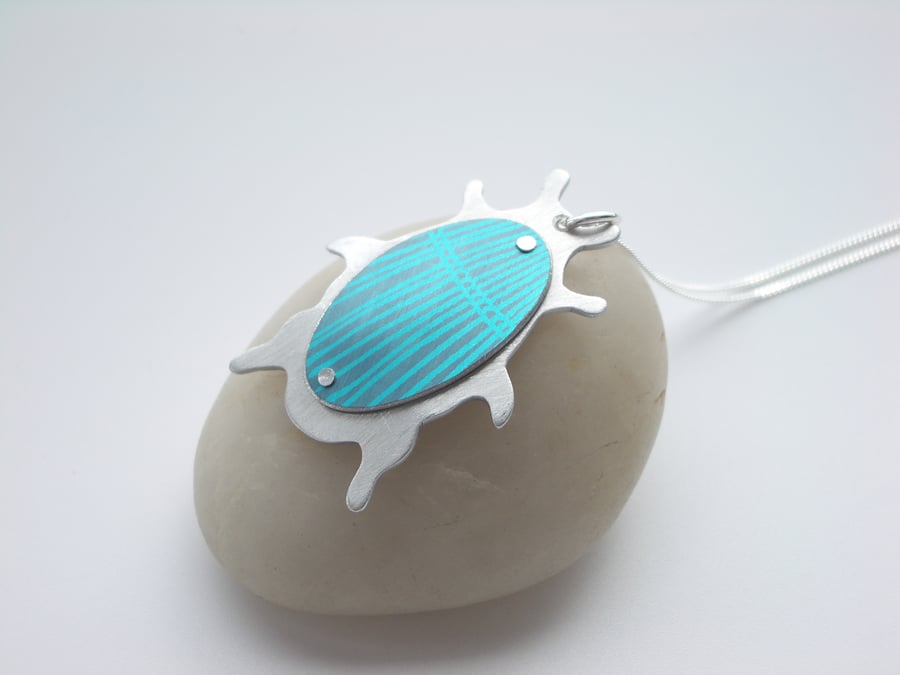 Beetle pendant necklace in teal and turquoise
