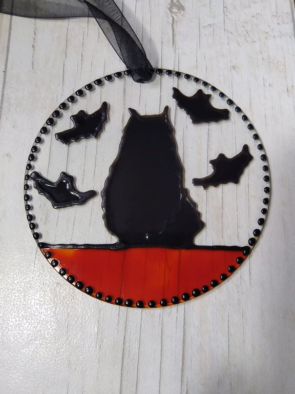 Halloween black cat and bats sun catcher decoration.