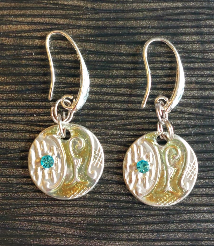     Perfectly Imperfect Ocean design disc earrings.