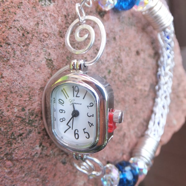Watch with silver bracelet