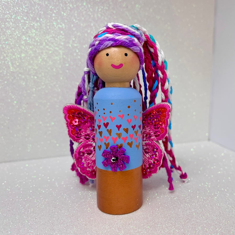 Pink Fairy Peg Doll Ornament with rainbow hair.