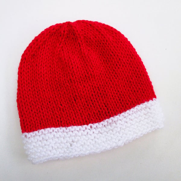 Hand knitted baby hat in red and white for Christmas