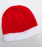 Hand knitted baby hat in red and white for Christmas