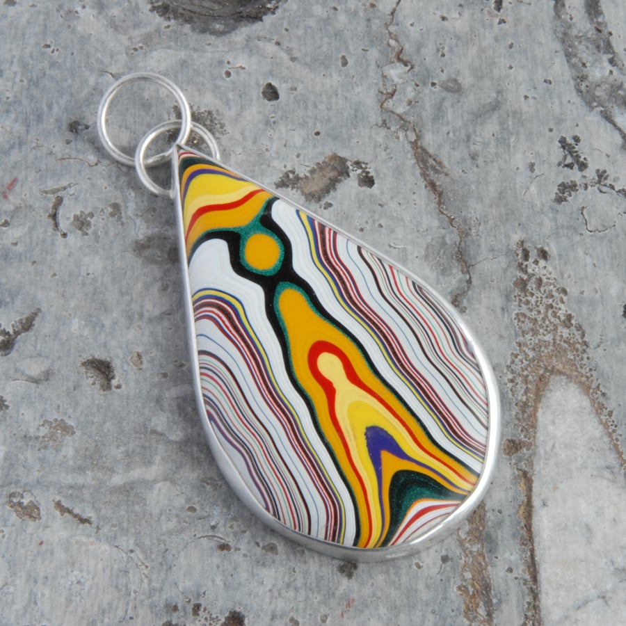 Sterling silver and unusual yellow fordite pendant