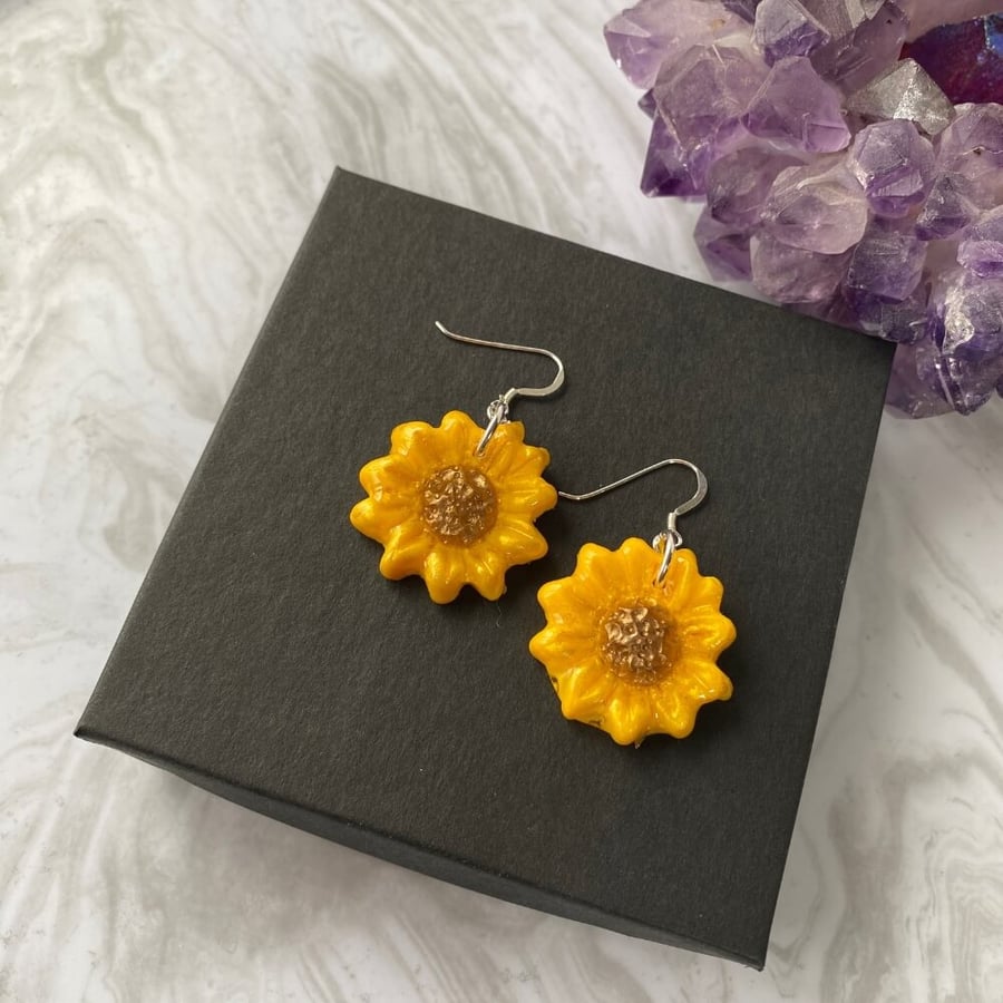 Sunflower earrings hand painted polymer clay and resin on sterling silver.