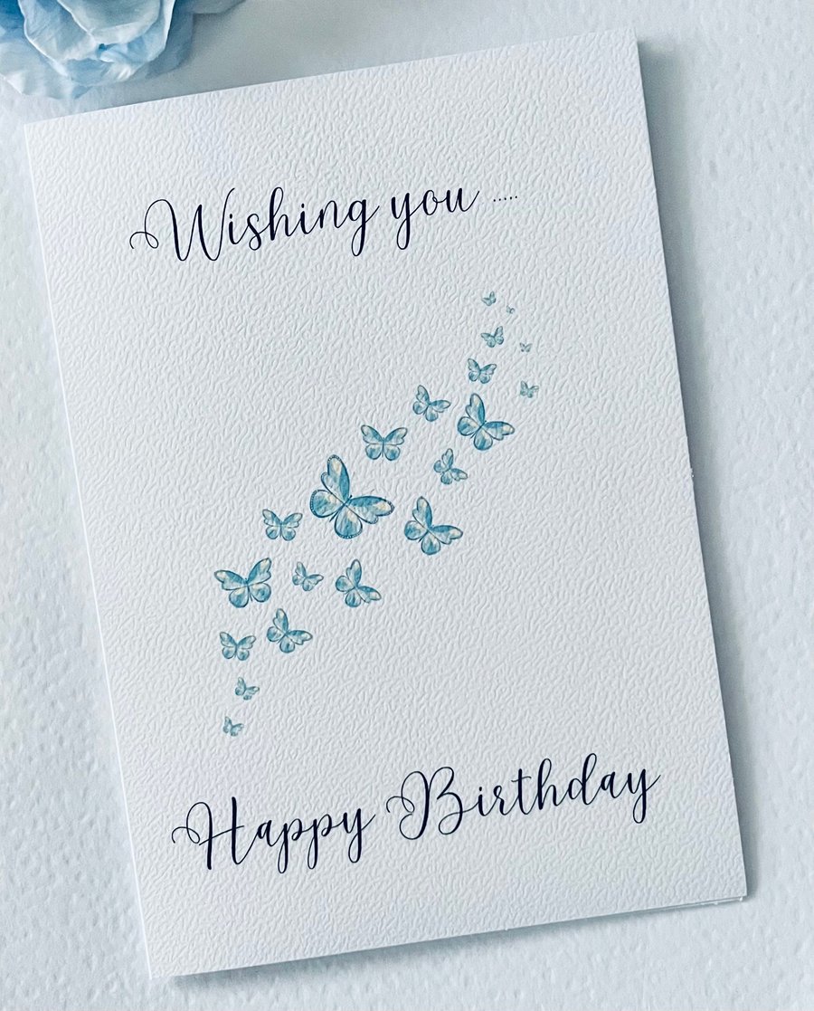 Wishing you happy birthday card with blue butterflies