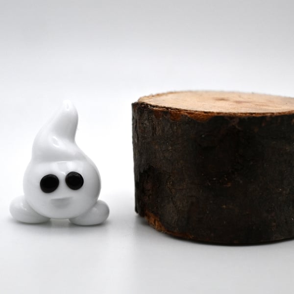 small glass ghost figure