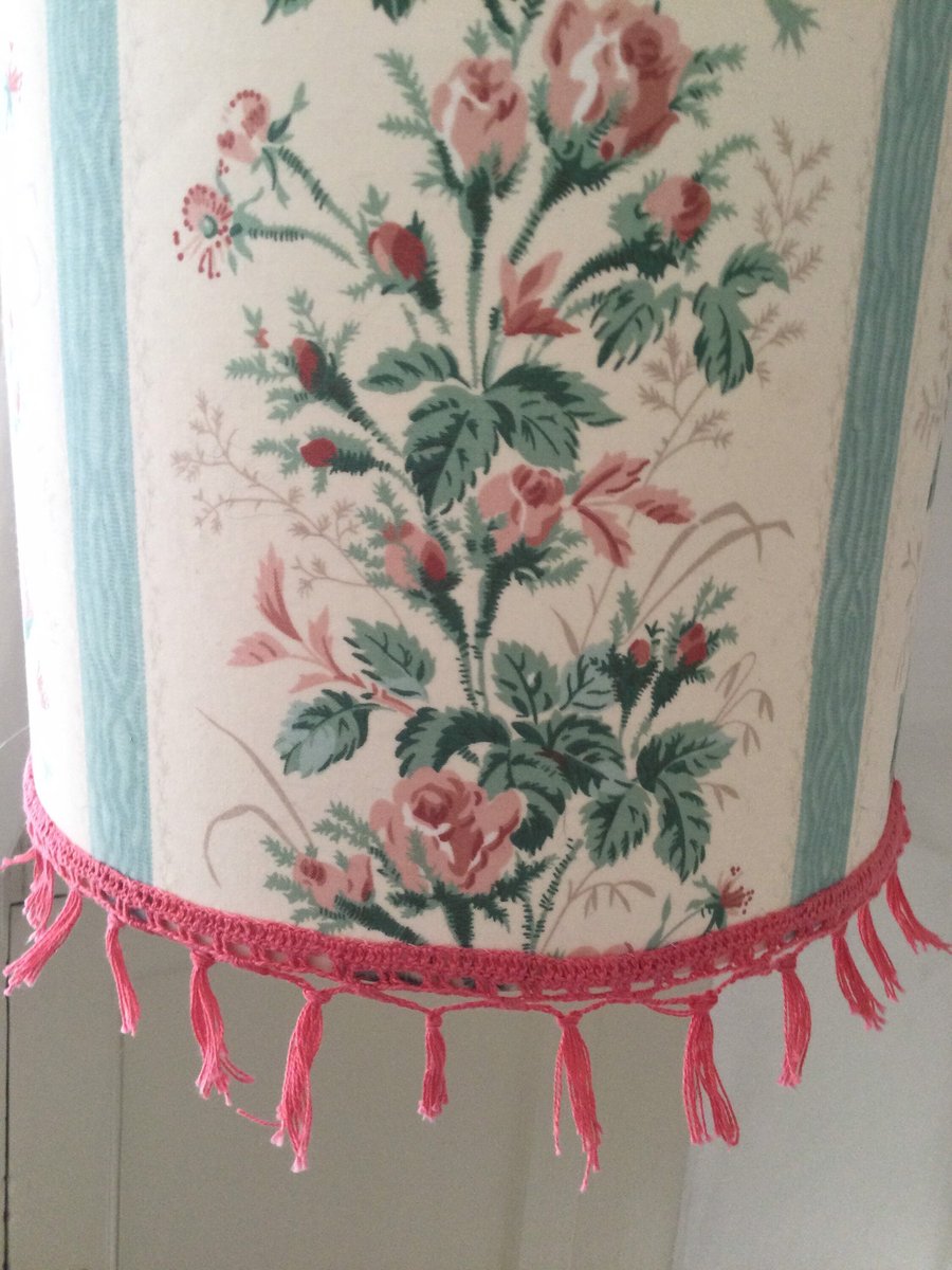 Handmade, rambling rose design light shade with crocheted fringe.