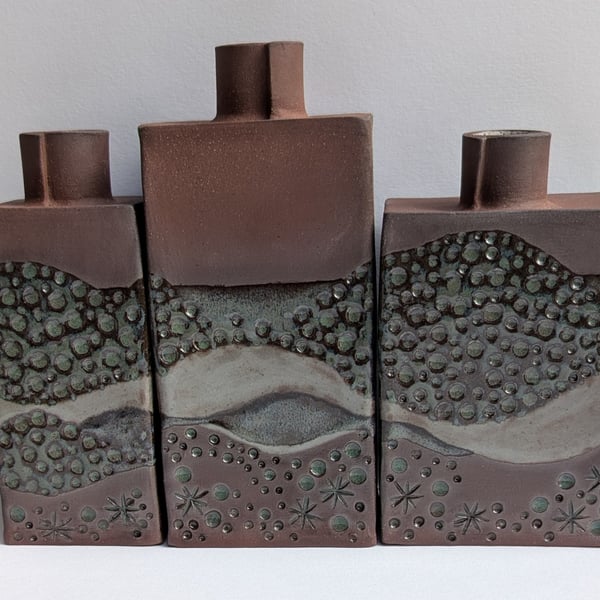 Trio of stoneware bud vases