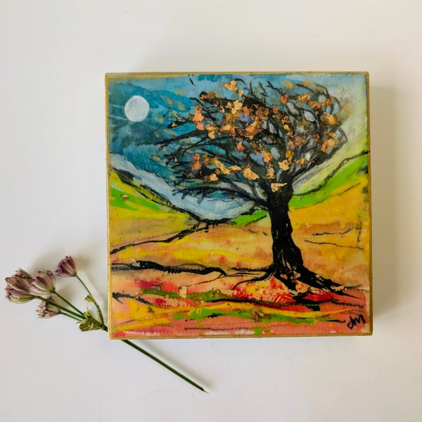 "Silent Guardian" is a mixed media artwork 