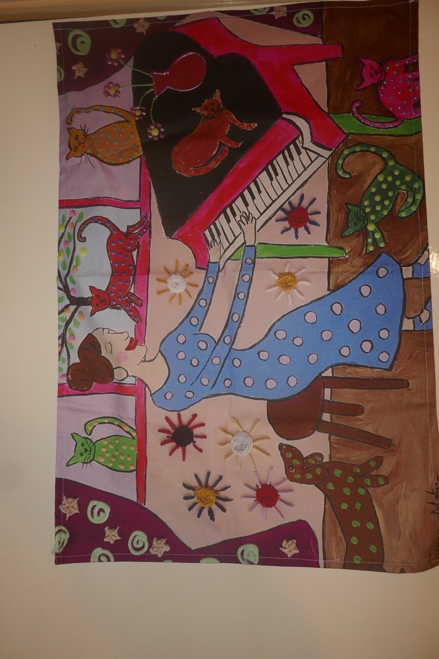 The Eccentric Cat Woman playing her Piano Teatowel 