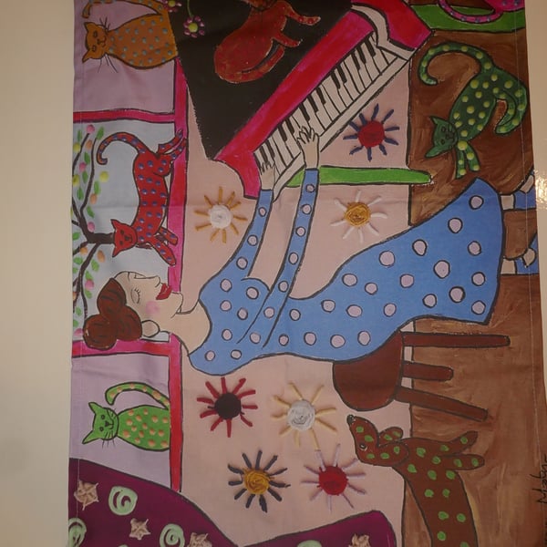 The Eccentric Cat Woman playing her Piano Teatowel 