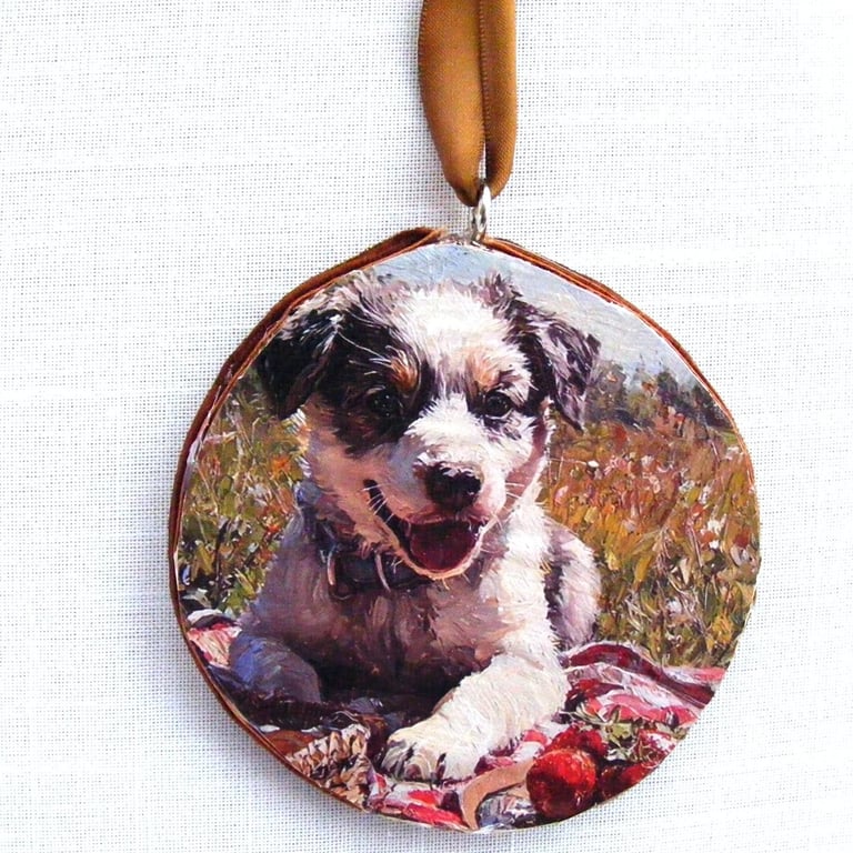 Dog decoupaged log slice wall decoration.