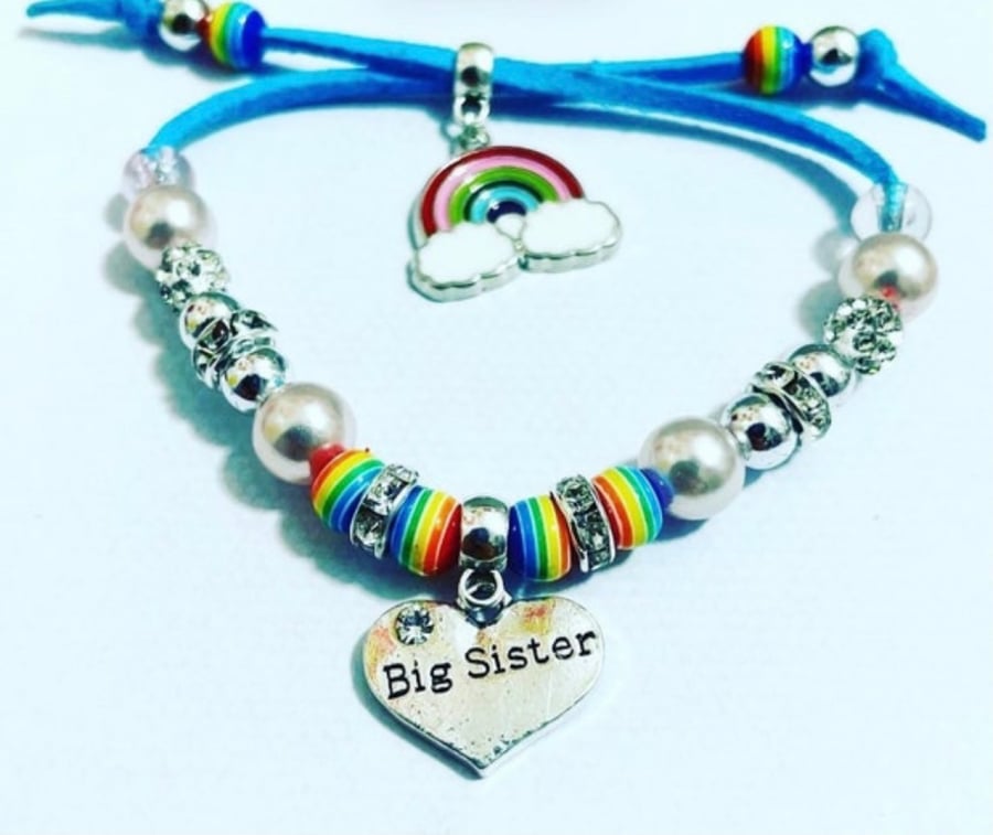 Big sister blue corded adjustable suede effect rainbow bracelet 