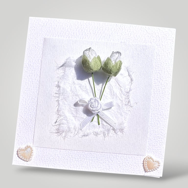 Handmade White Rose Embossed Greeting Card with handmade fibre paper.