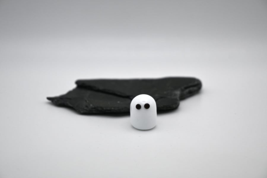 small glass ghost figure