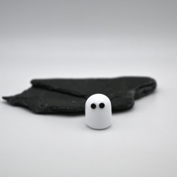 small glass ghost figure