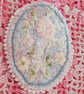 Oval, textile brooch with pastel, embroidered flowers. - Image 7