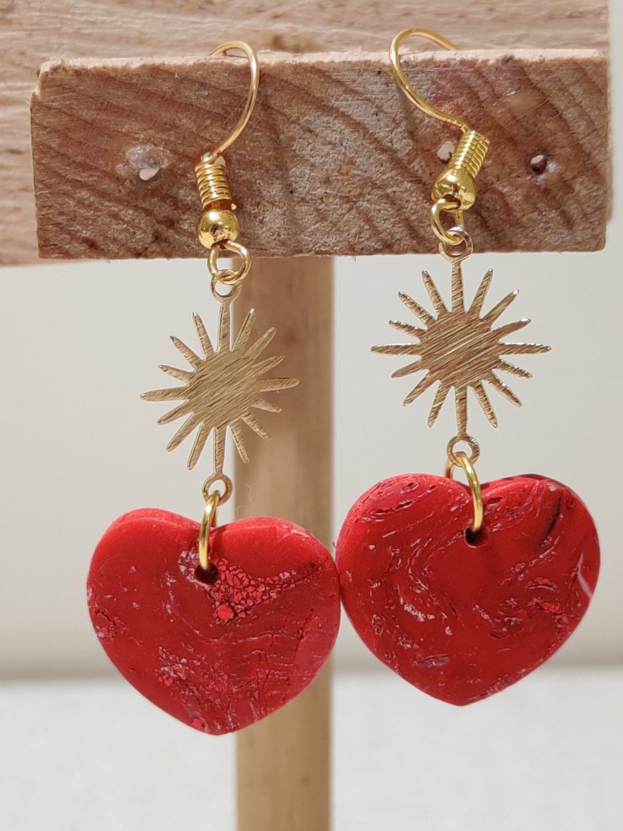 Love heart gold dangle earrings