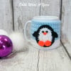 Crochet penguin mug hug, mug cosy, mug cozy.