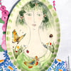 Figurative shallow dish-wall hanging 