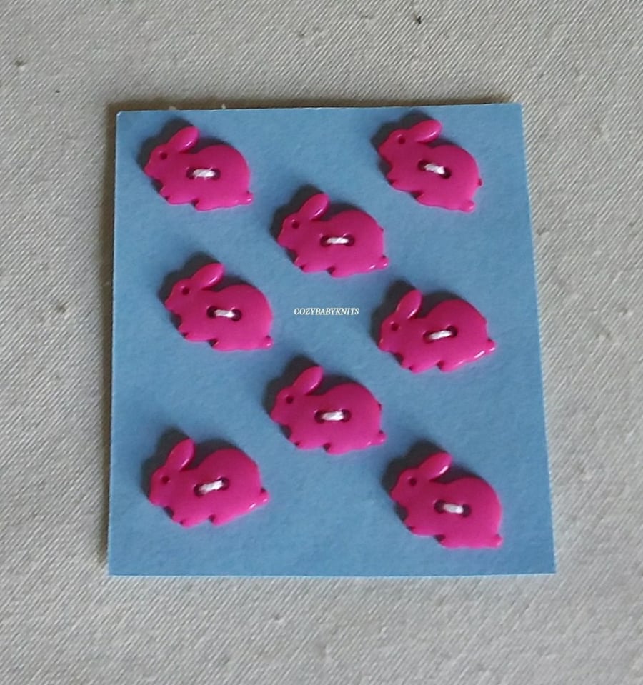 Pink rabbit buttons.