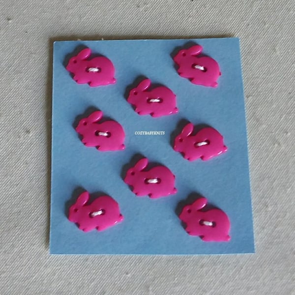 Pink rabbit buttons.