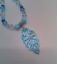Necklace with Blue and Clear Bicone Beads and a Shell Pendant, Blue Pendant - Image 8