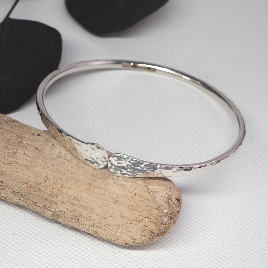 Solid silver forged bangle