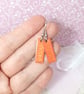 Bright orange dangle earrings, colourful dainty steel earrings