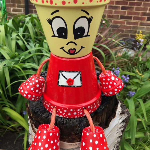 Flower pot people planter