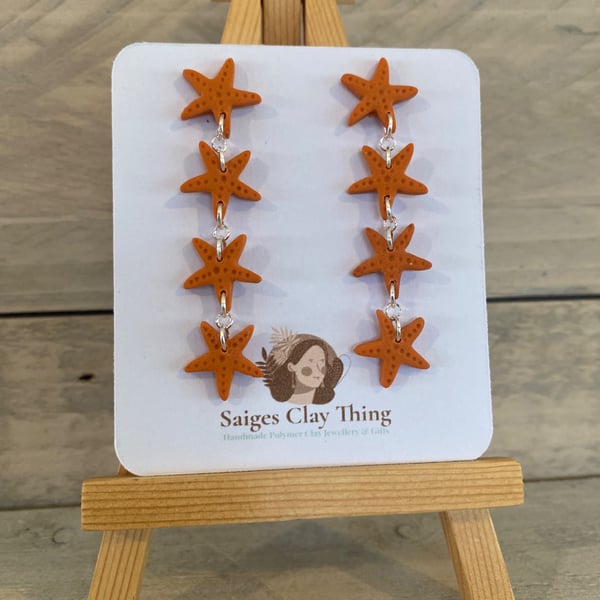 Orange Star Fish Dangle earrings. 