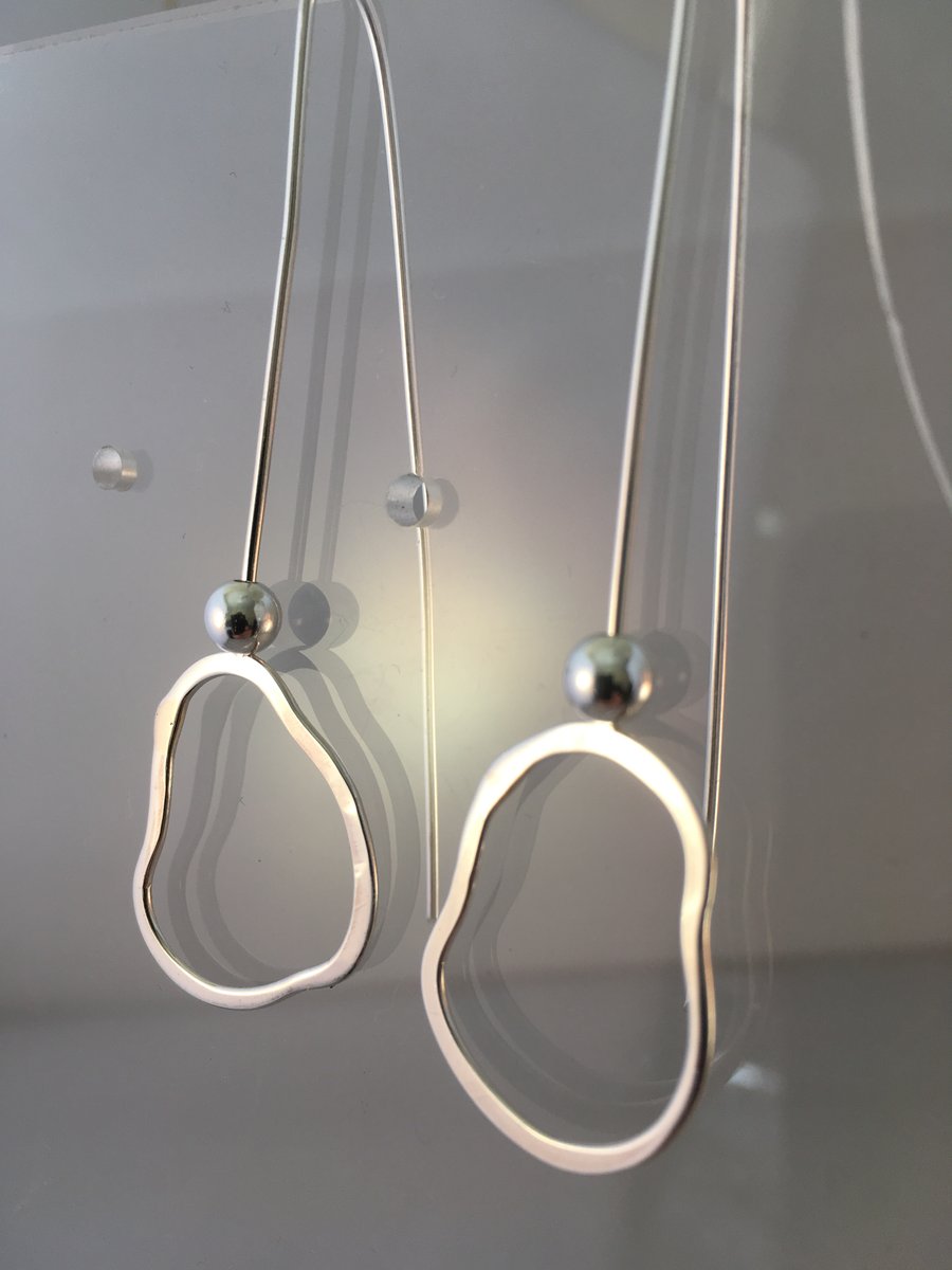 Silver beads oval earrings