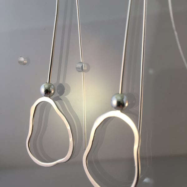 Silver beads oval earrings
