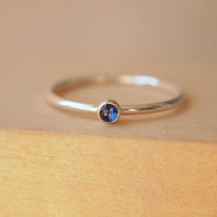 Sapphire and Sterling Silver Ring with small gemstone