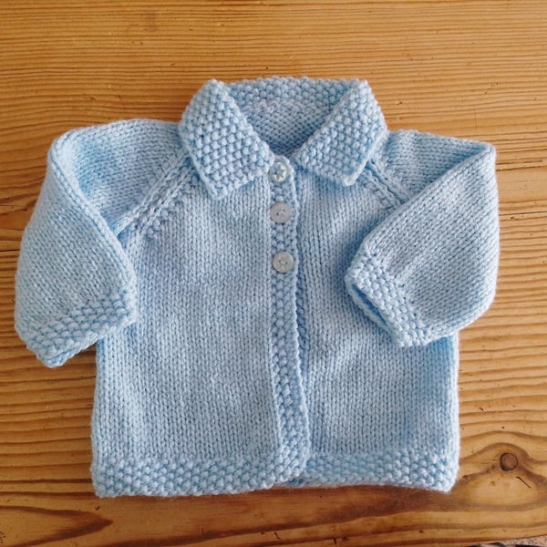 Handmade blue baby cardigan with collar age 0-3 months.
