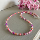 Shades of pink beaded necklace, seed beads