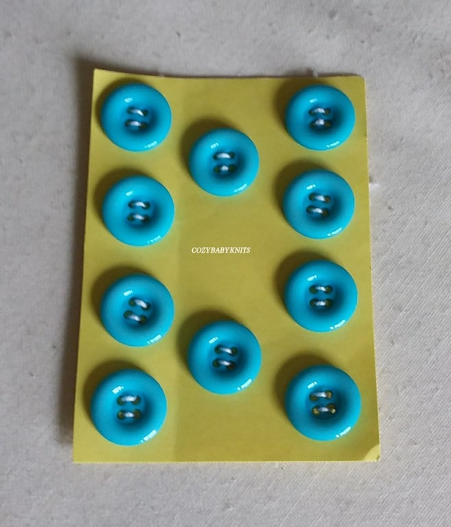 Mid blue round buttons four holes for attaching